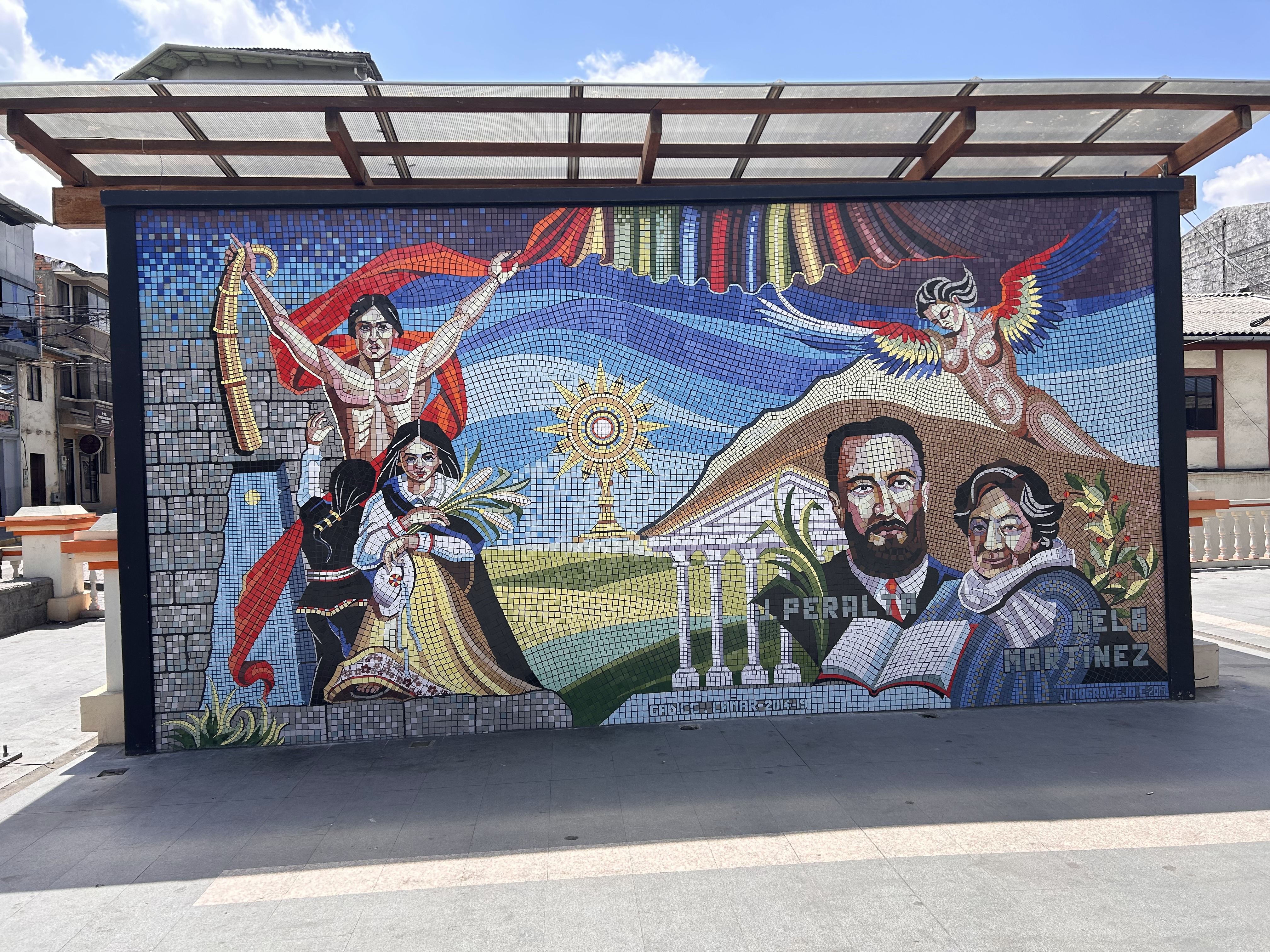 Street scene in Quito with images of indigenous heroes