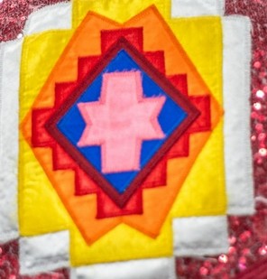 applique design on regalia shirt